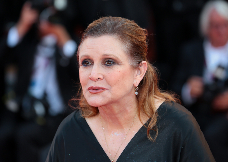 Memoir-writing advice from Carrie Fisher - pictured here at the Venice International Film Festival, 2012